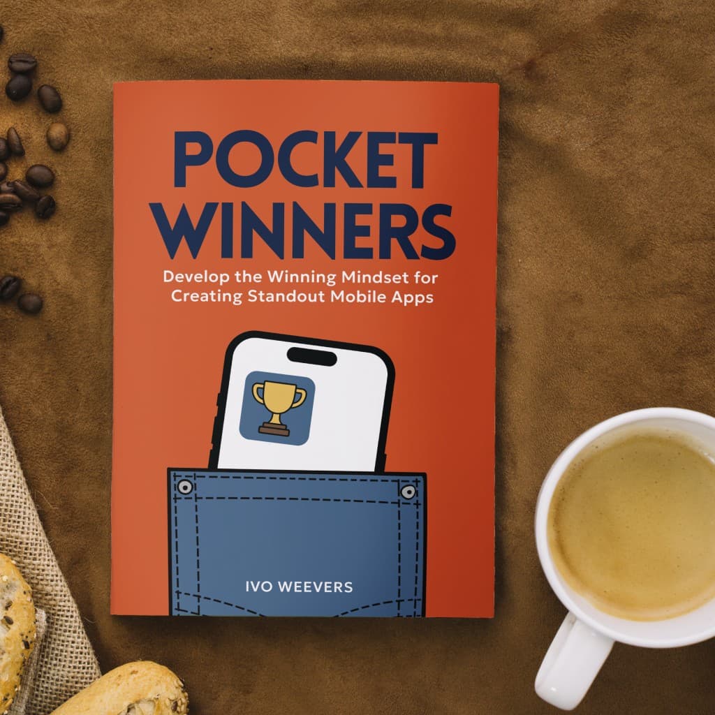 Pocket Winners book with coffee, flat lay